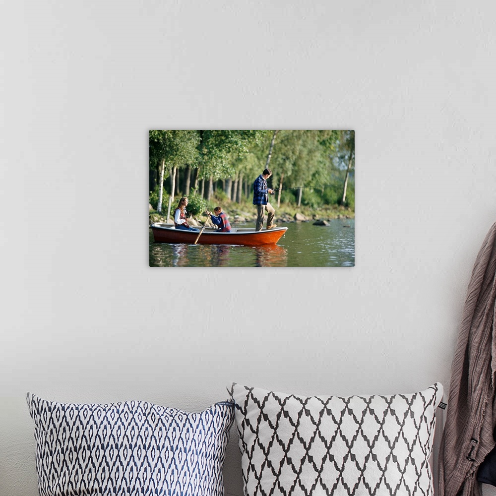 A bohemian room featuring Family fishing from boat
