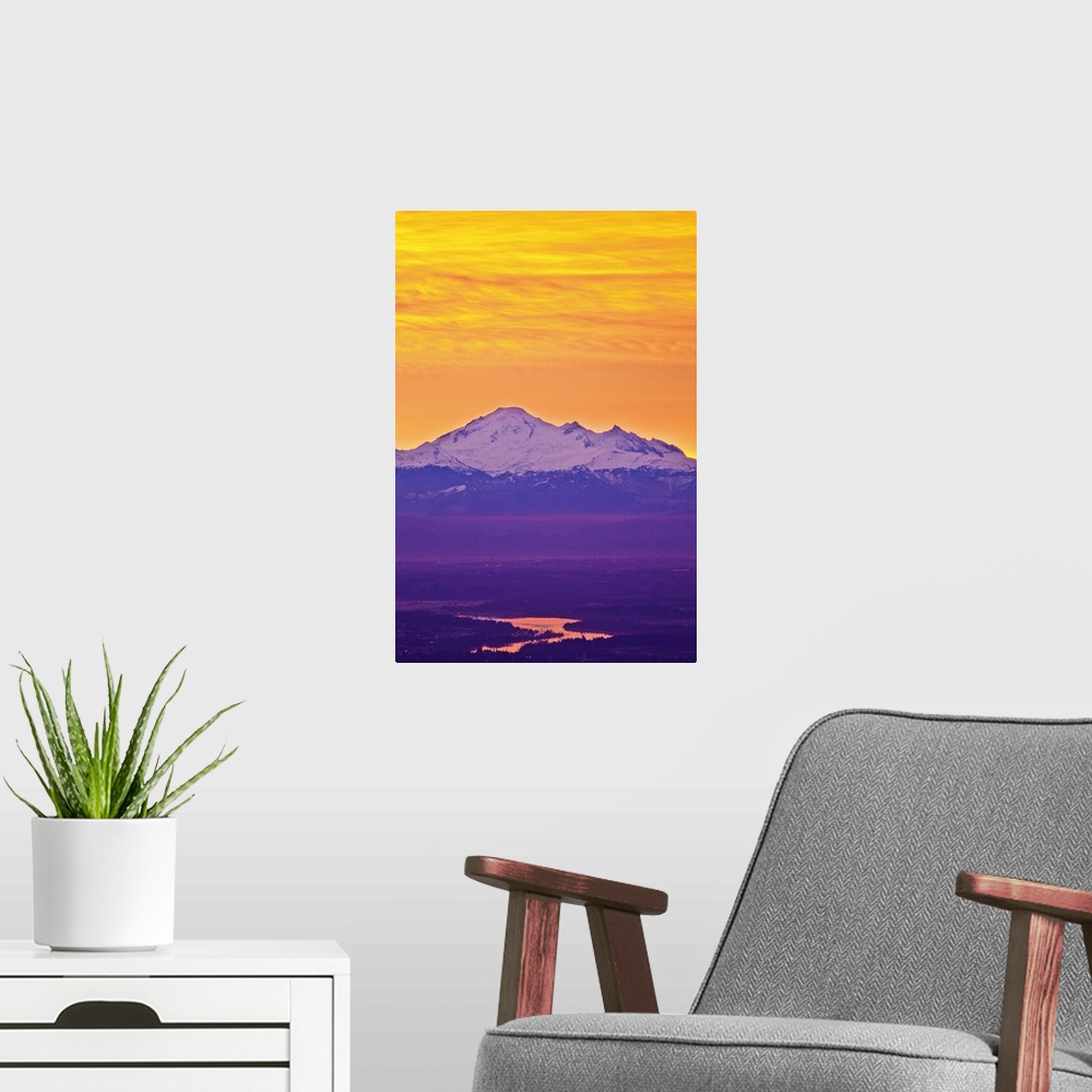 A modern room featuring Famous Mt.Baker volcano, located in  North Cascade Mountain Range dominates background while earl...