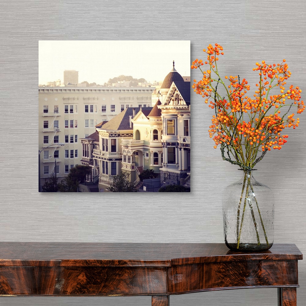 A traditional room featuring Famous 'painted ladies' of Alamo Square, San Francisco, at sunset.