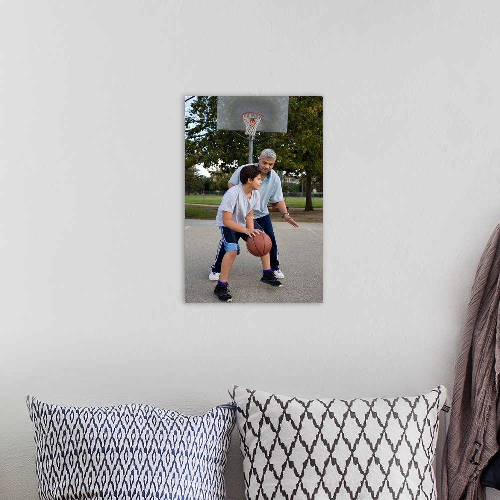 A bohemian room featuring Hispanic father and son playing basketball