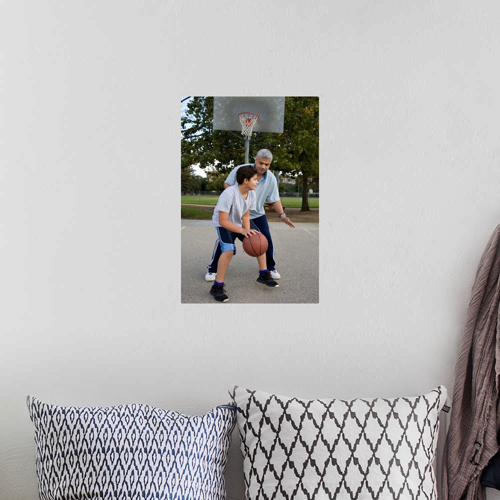 A bohemian room featuring Hispanic father and son playing basketball