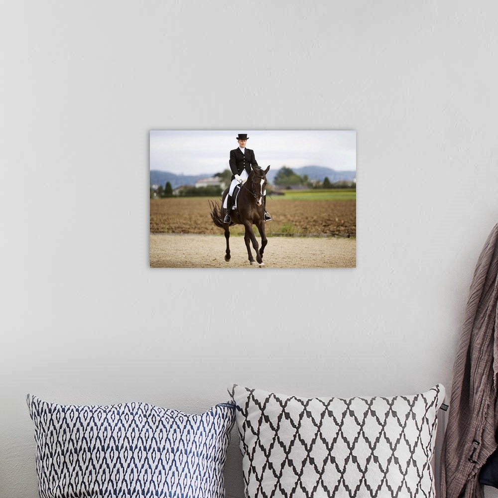 A bohemian room featuring Female dressage rider exercising