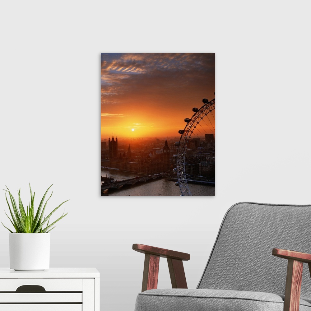 A modern room featuring Ferris Wheel at sunset over the Thames River