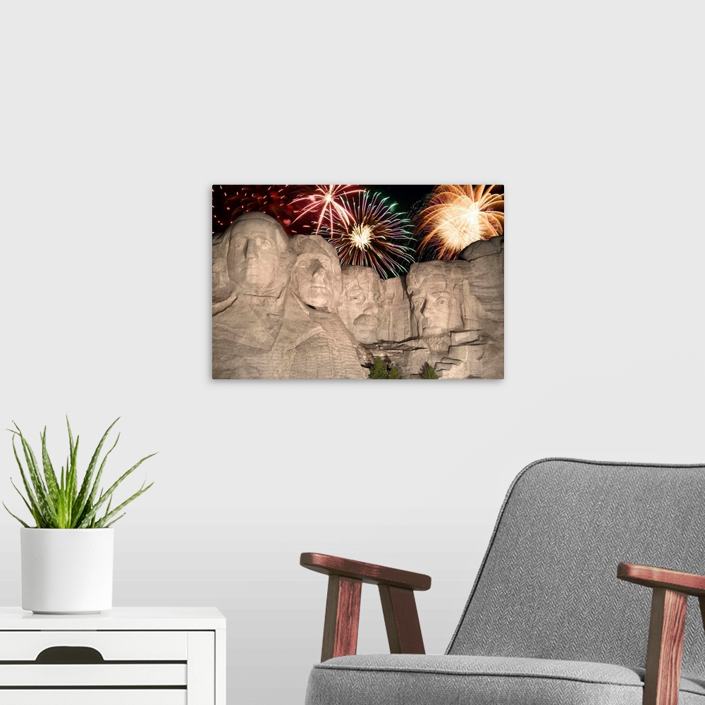 A modern room featuring Fireworks behind Mount Rushmore