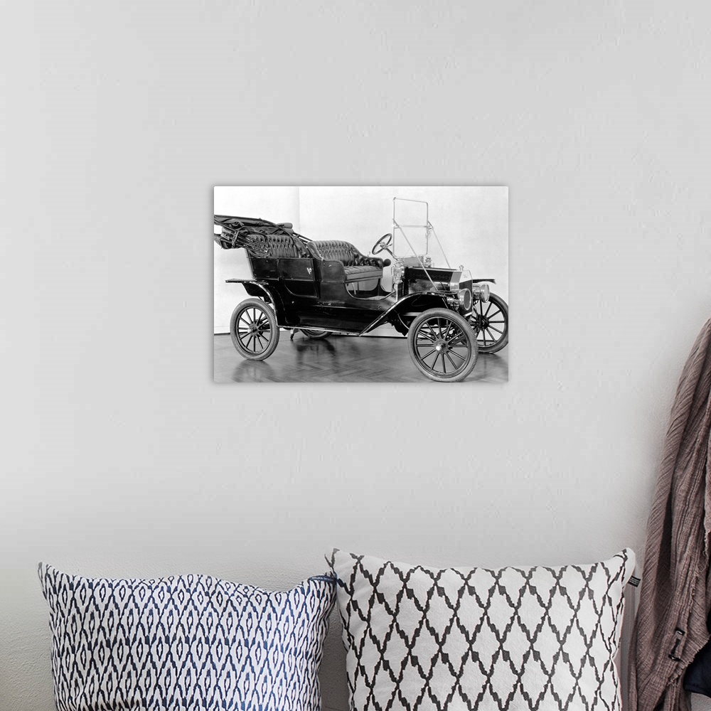 A bohemian room featuring The first Model T Ford, built in 1908.