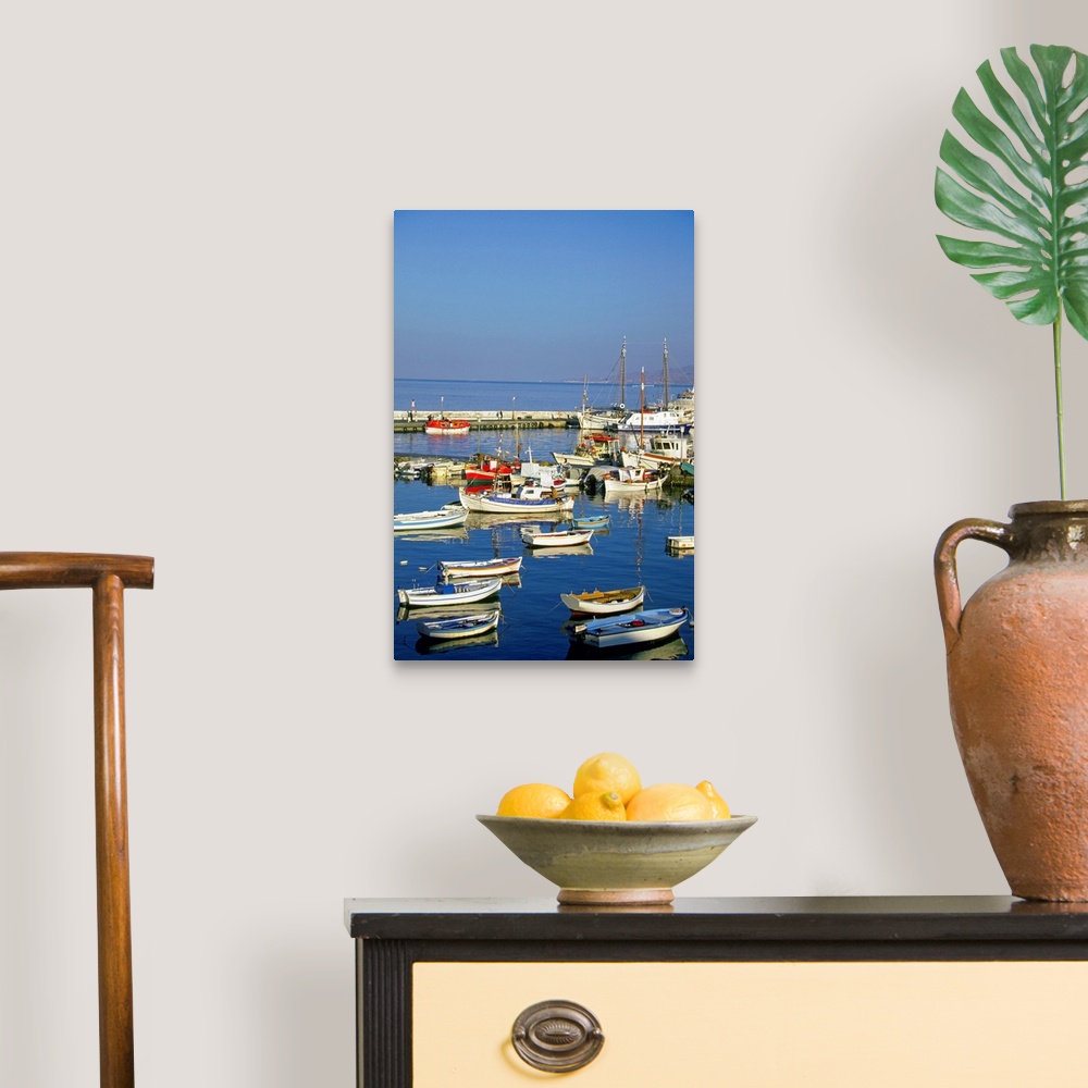 A traditional room featuring Fishing boats docked at a harbor, Mykonos, Greece