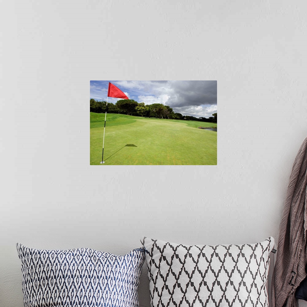 A bohemian room featuring Flag on golf course