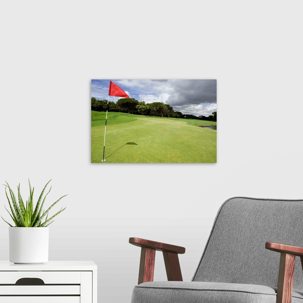 A modern room featuring Flag on golf course