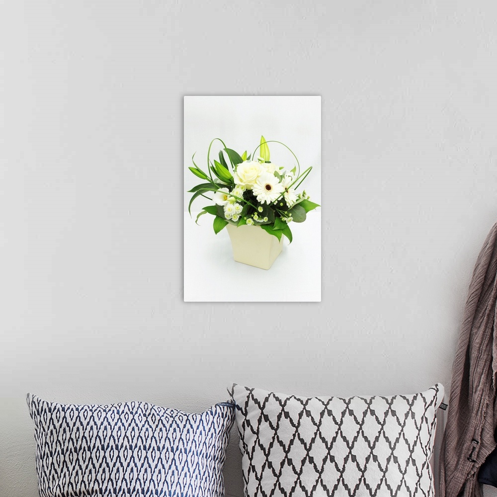 A bohemian room featuring Flower bouquet against white background.