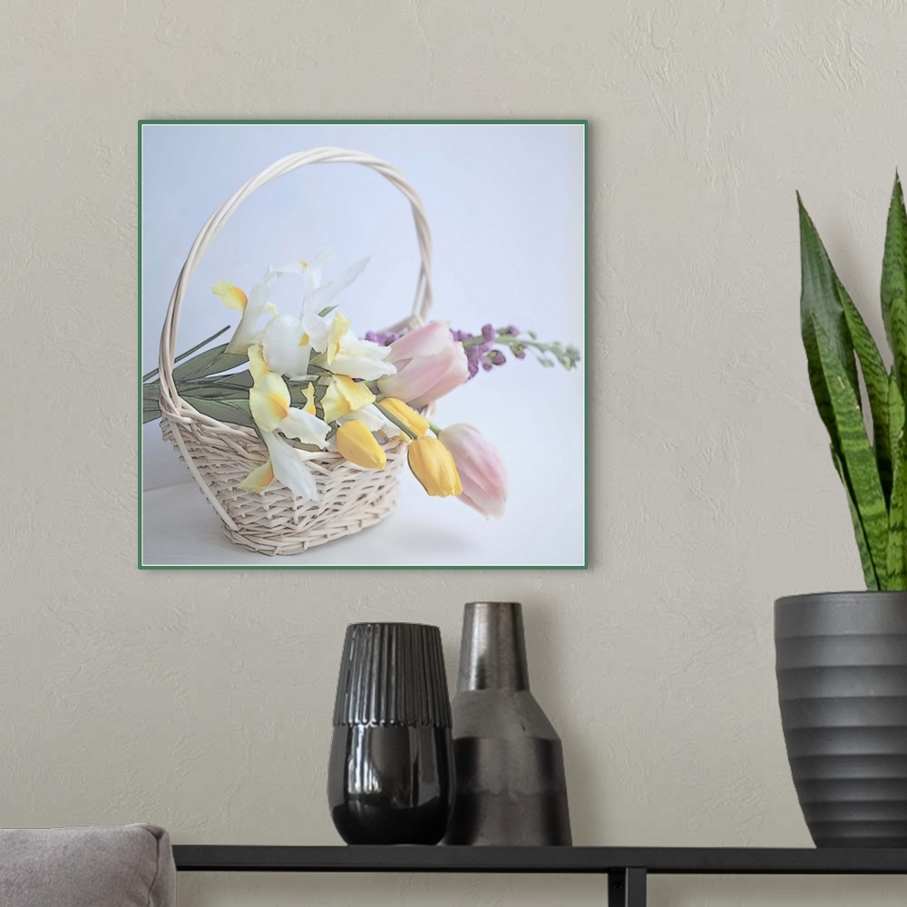 A modern room featuring Flowers in basket.