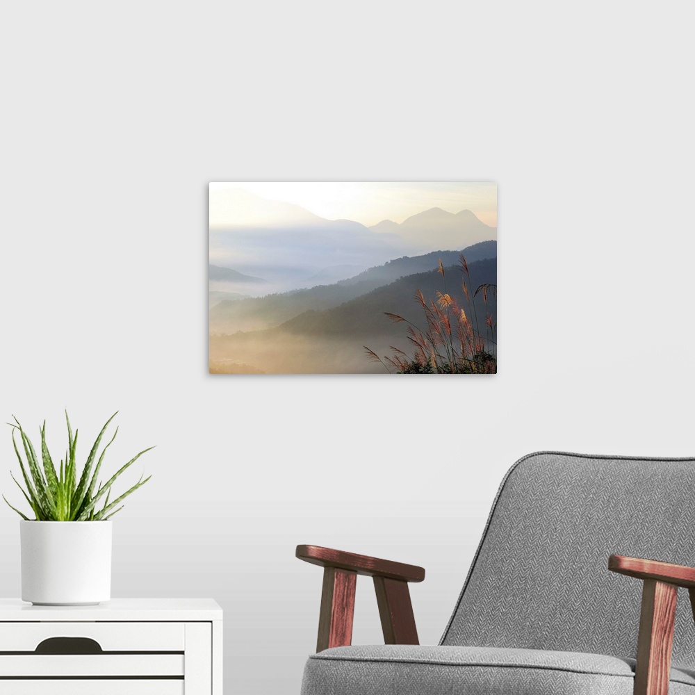 A modern room featuring Foggy mountain at sunrise against scenic view.