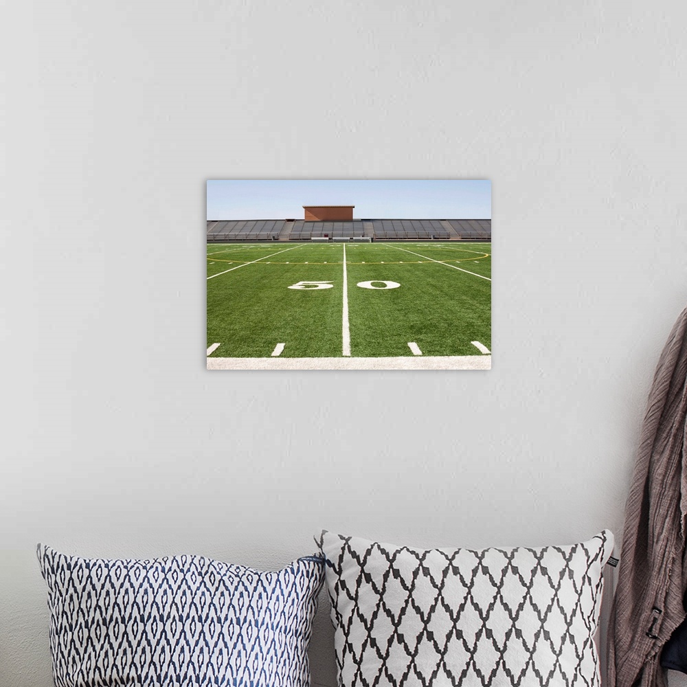 A bohemian room featuring Football field and stadium