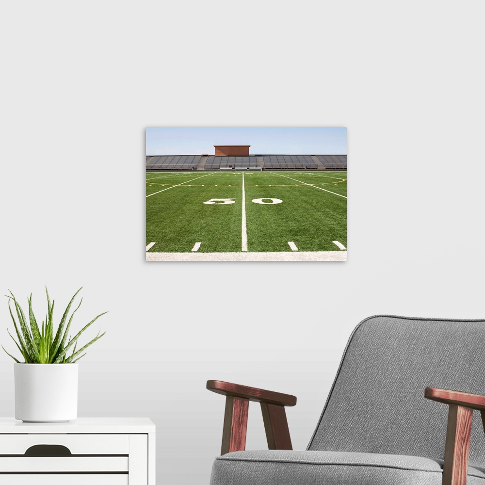 A modern room featuring Football field and stadium