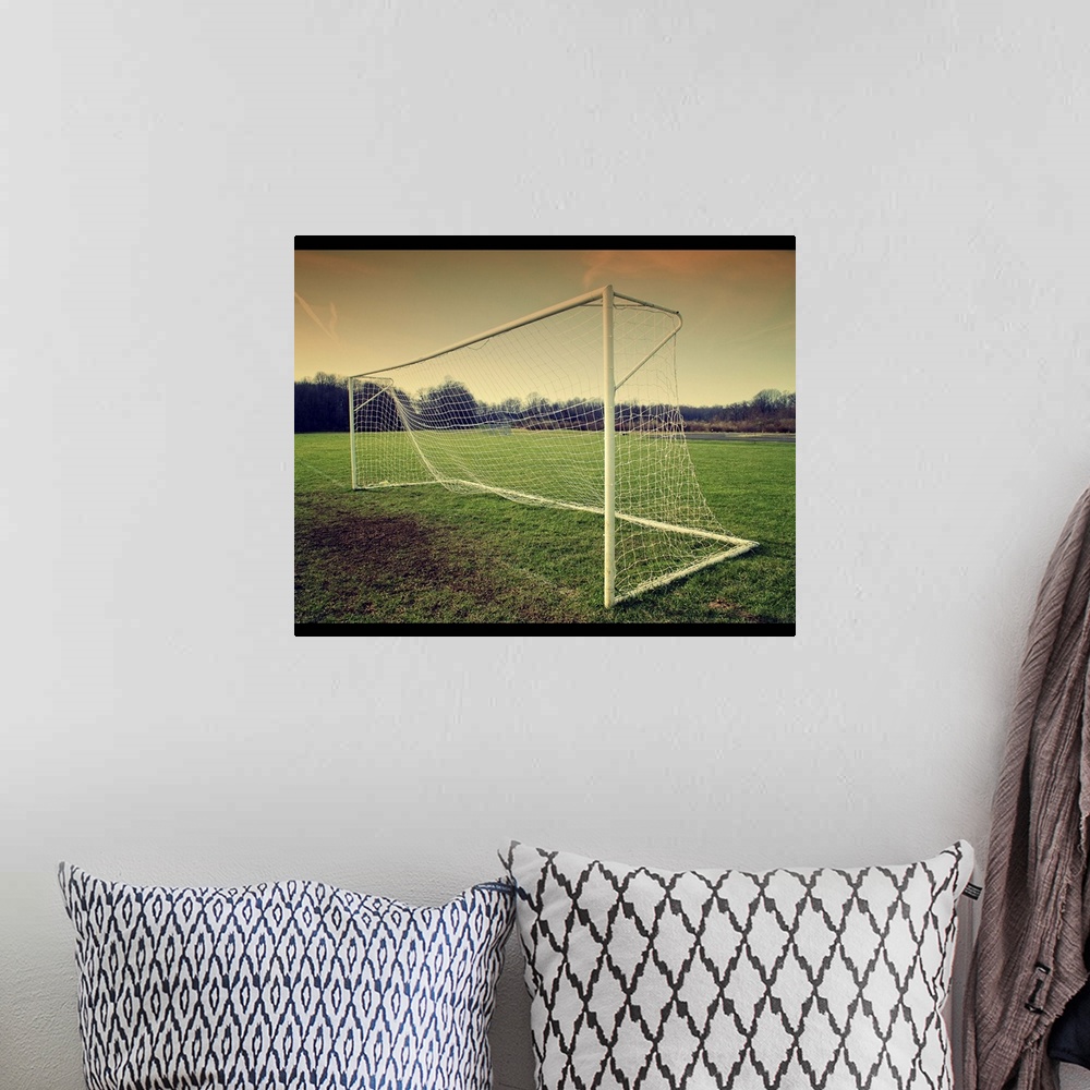 A bohemian room featuring Football Goal.
