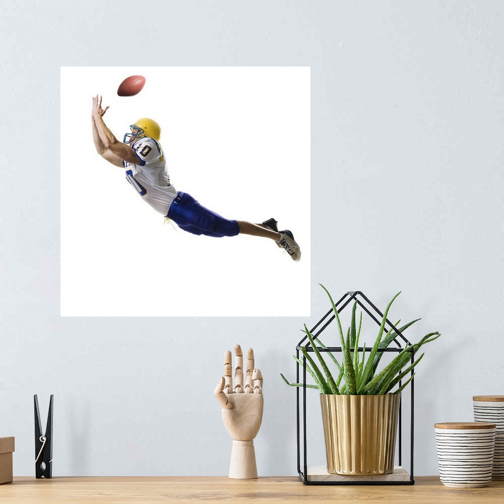 A bohemian room featuring Football player catching a pass