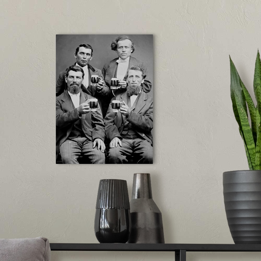 A modern room featuring Four buddies get together and toast themselves with beer for a tintype portrait.
