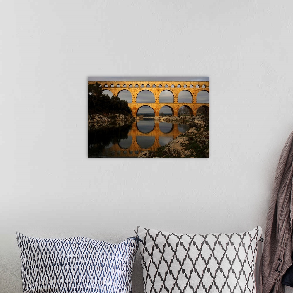A bohemian room featuring France,Languedoc Roussillon,pont du Gard over river Gardon.