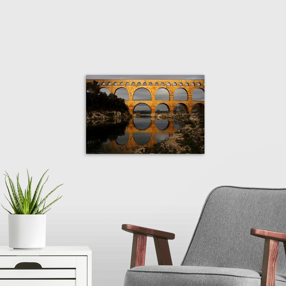 A modern room featuring France,Languedoc Roussillon,pont du Gard over river Gardon.