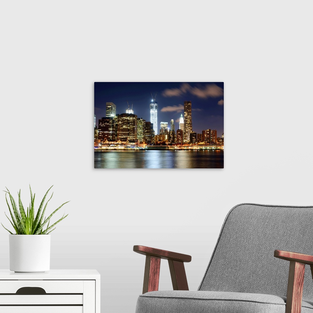 A modern room featuring Freedom Tower, One World Trade Center, night, East River, Downtown Manhattan, Manhattan, New York...