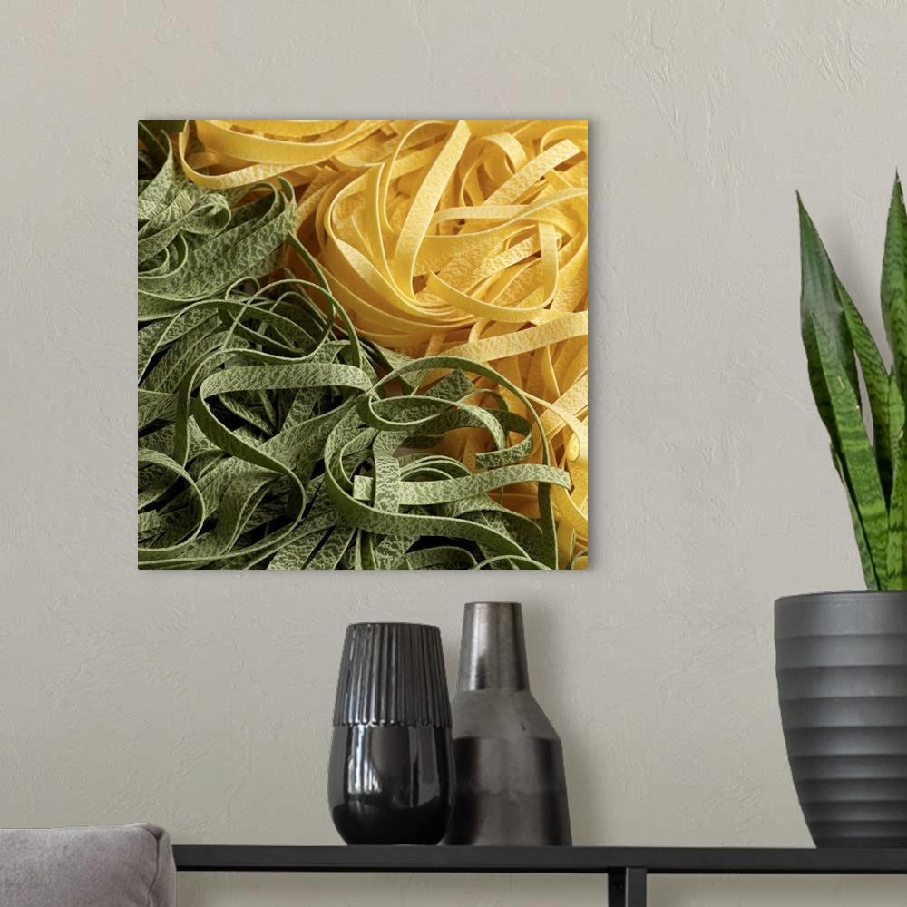 A modern room featuring Fresh dry fettuccini pasta in green and yellow