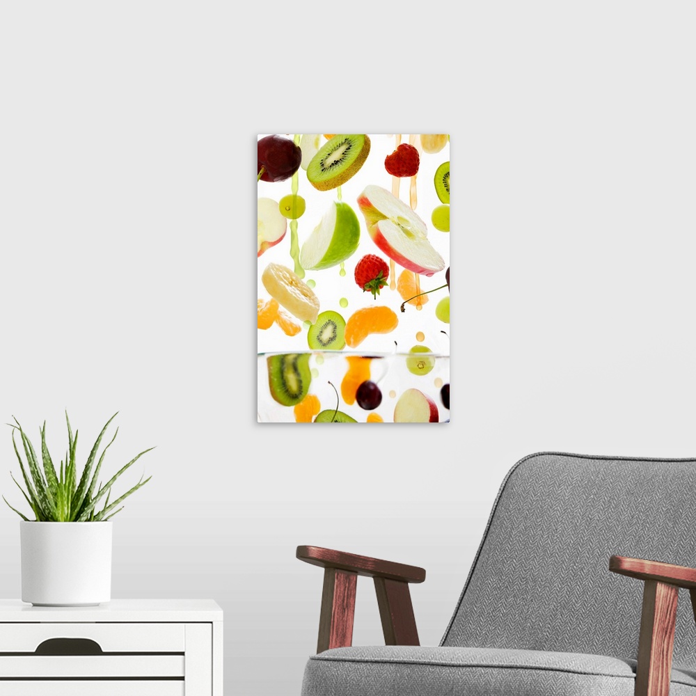 A modern room featuring Fresh mixed fruit with apple & orange juice