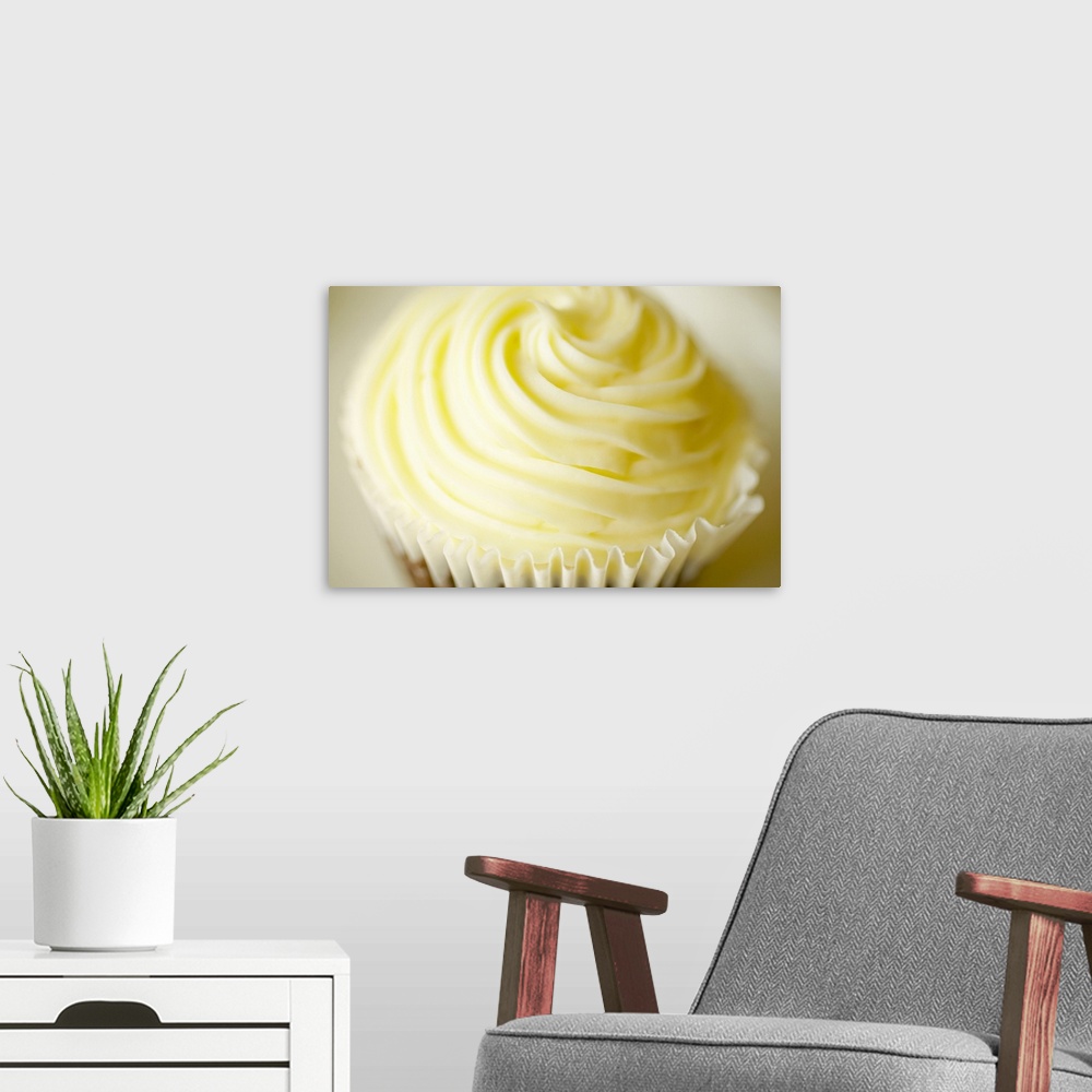 A modern room featuring Frosted cupcake