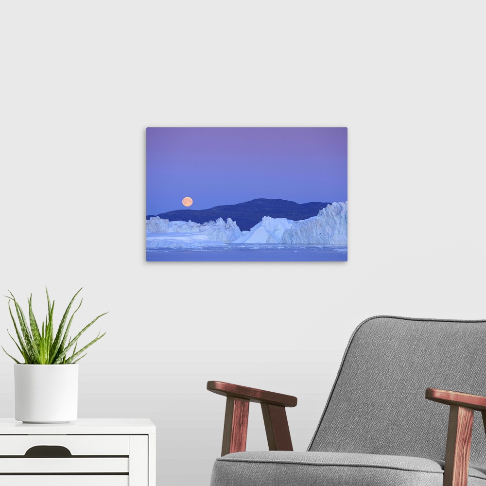 A modern room featuring Full moon over iceberg, Ilulissat, Icefjord, Greenland,