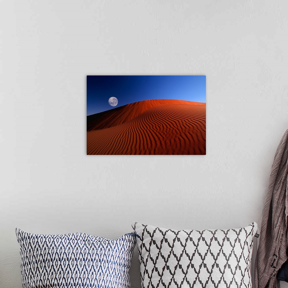 A bohemian room featuring Full Moon Over Red Dunes