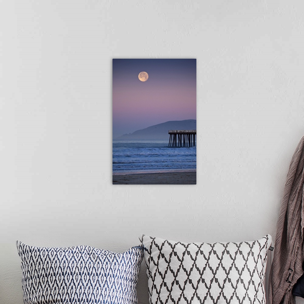 A bohemian room featuring Full moon sets over  Pismo Beach at sunrise on winter morning.