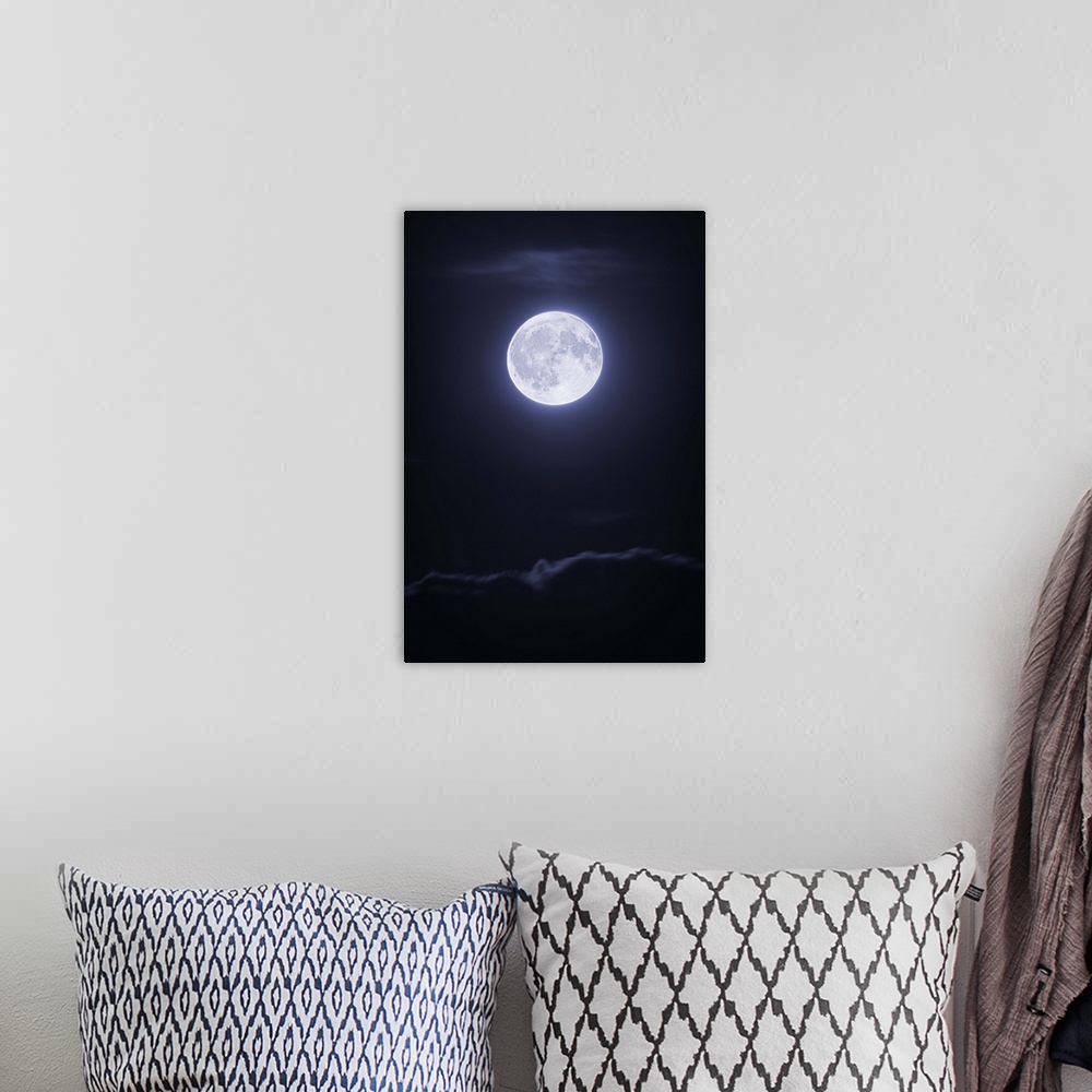 A bohemian room featuring Full moon with clouds at night