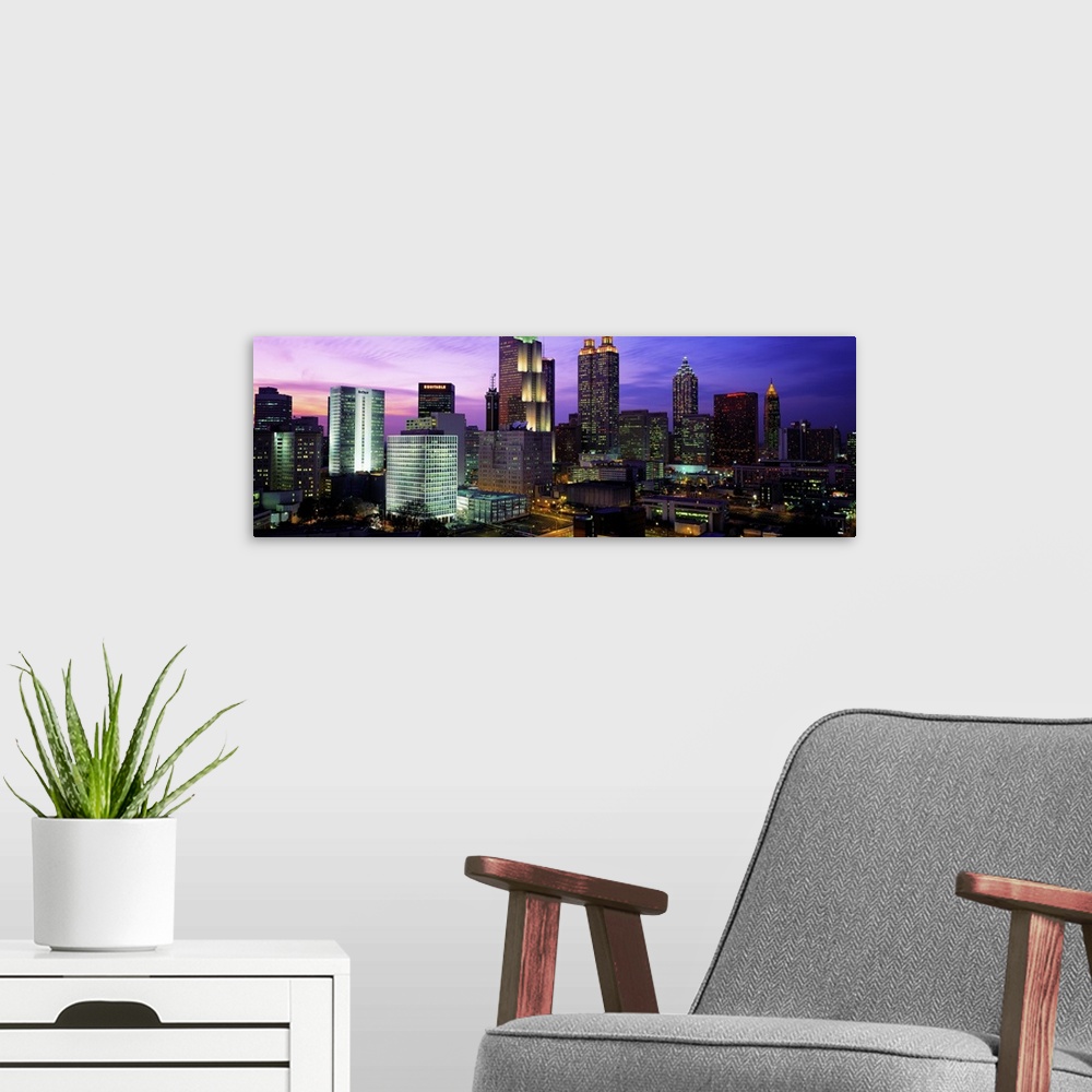 A modern room featuring USA, Georgia, Atlanta, skyline at night