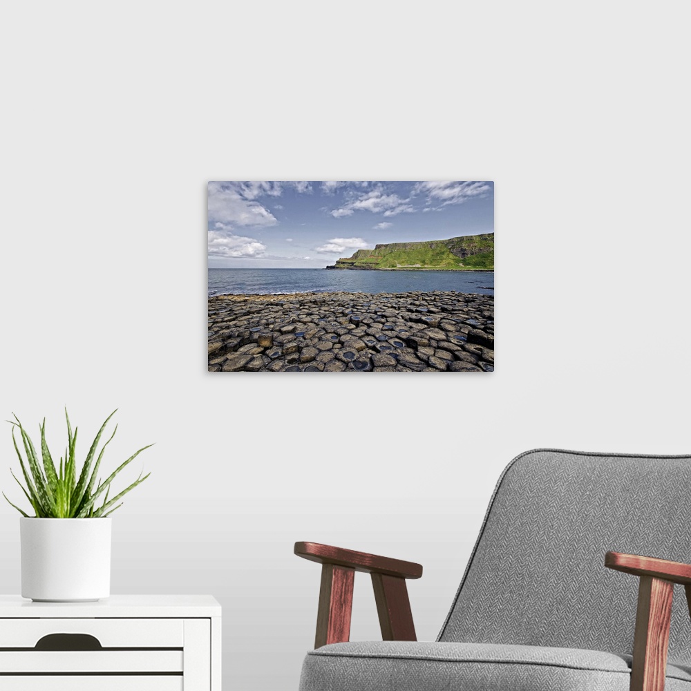 A modern room featuring Landscape of basaltic rock formations at the Giant's Causeway. A Unesco World Heritage Site in An...