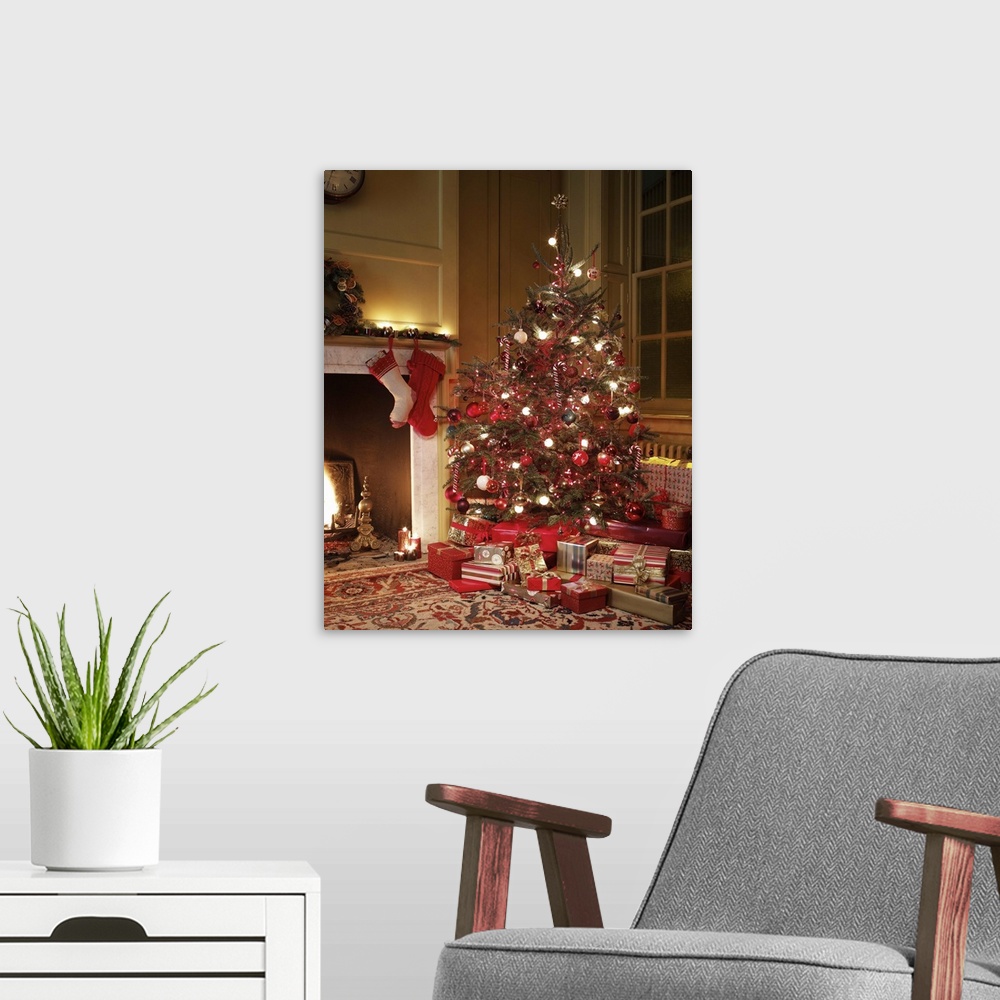 A modern room featuring Gifts in front of Christmas tree