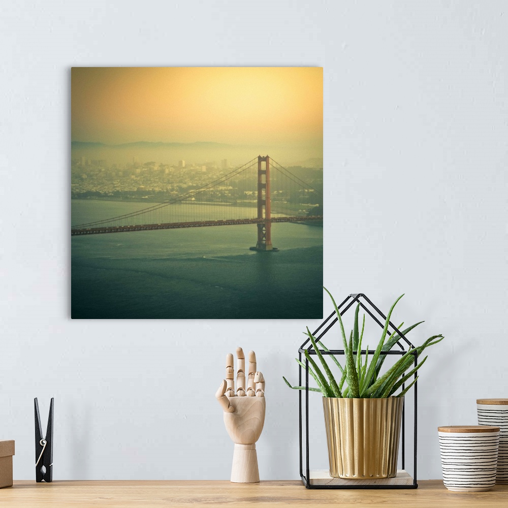 A bohemian room featuring Golden Gate bridge at sunset in San Francisco, US.