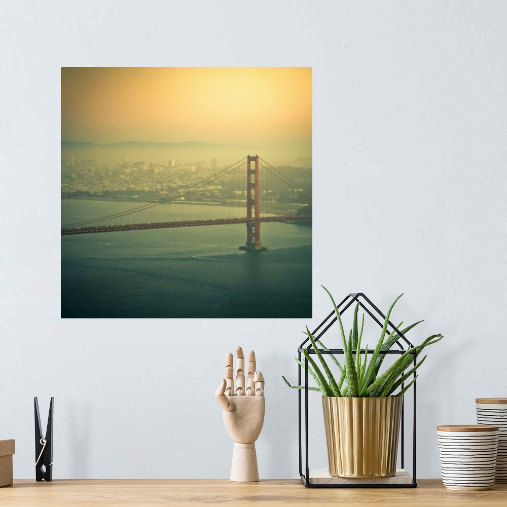 A bohemian room featuring Golden Gate bridge at sunset in San Francisco, US.
