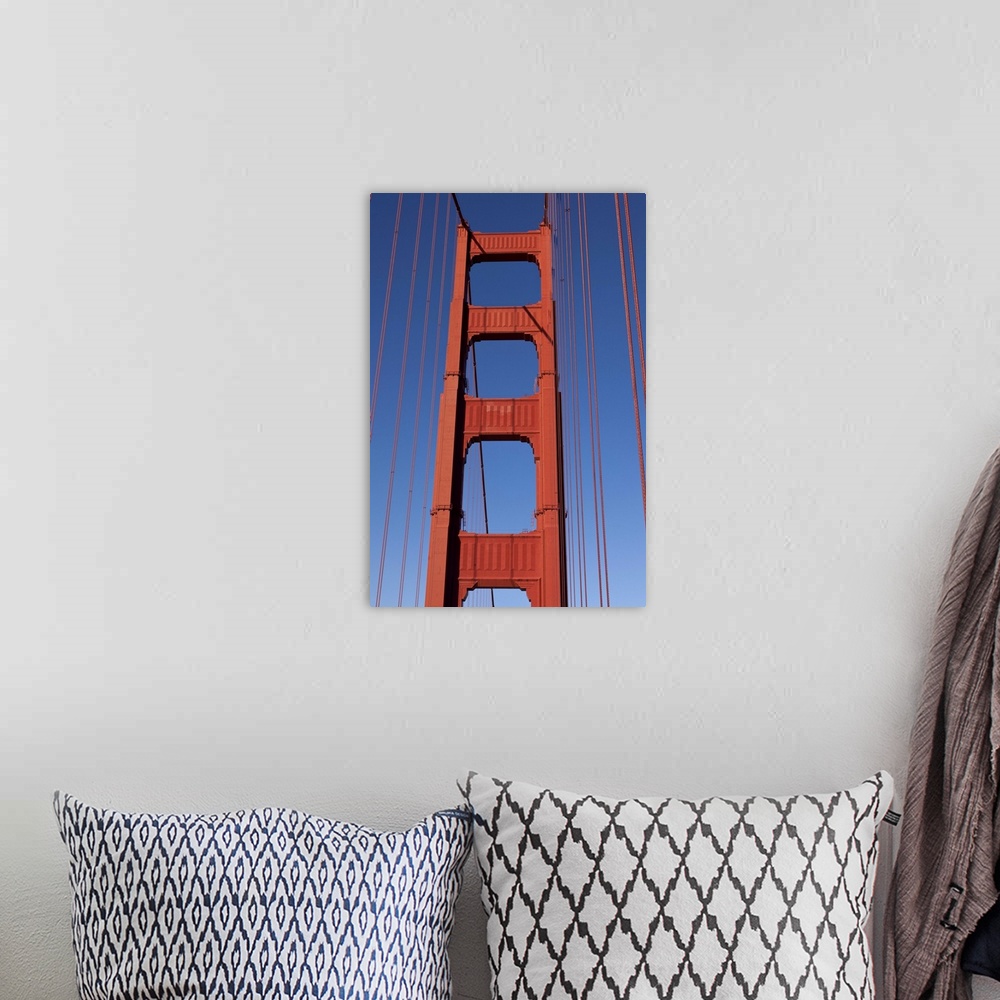 A bohemian room featuring Golden Gate Bridge Tower against blue sky