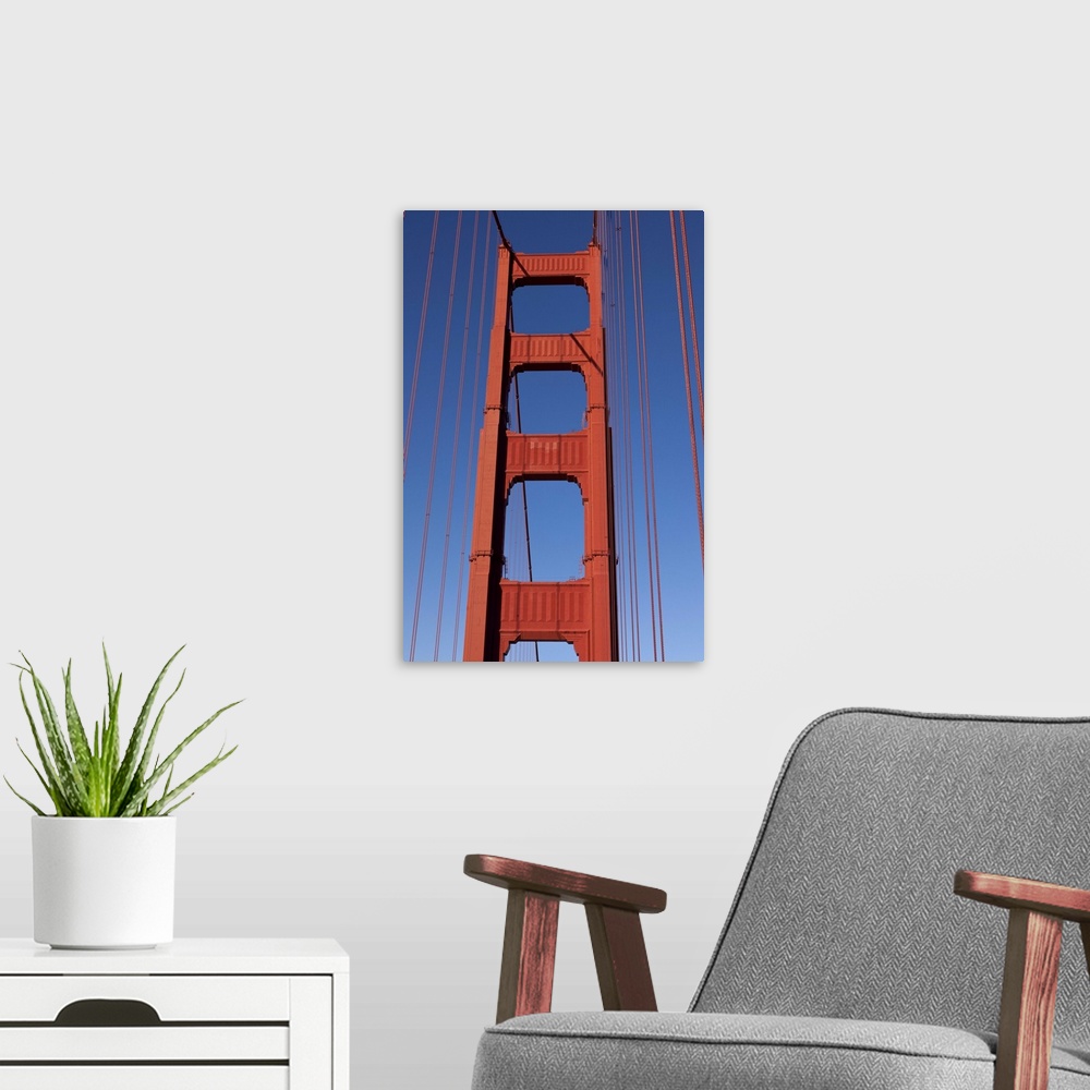 A modern room featuring Golden Gate Bridge Tower against blue sky
