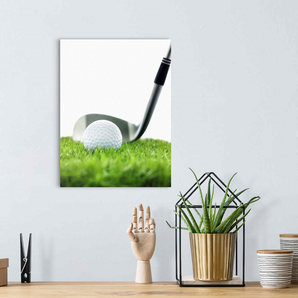 A bohemian room featuring Golf Club And Golf Ball On Grass