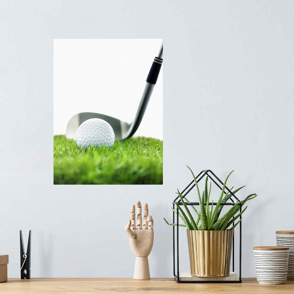A bohemian room featuring Golf Club And Golf Ball On Grass