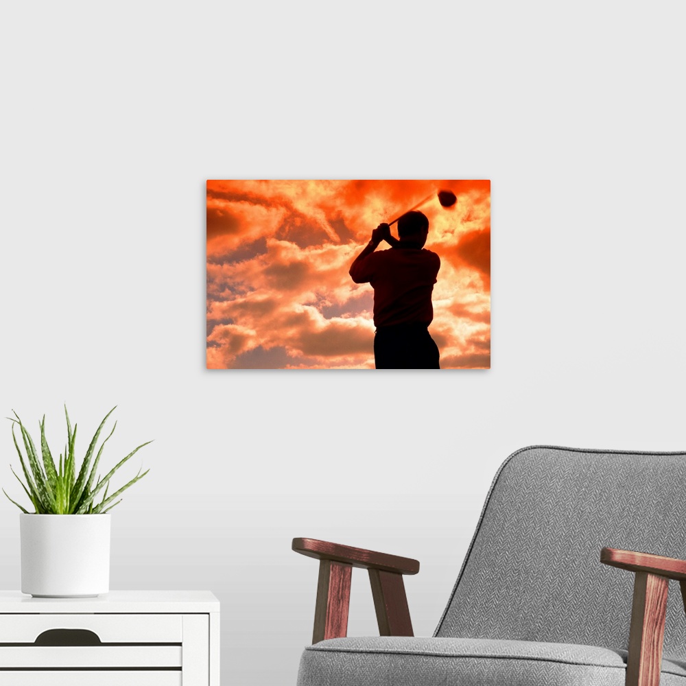 A modern room featuring golf player in the sunset