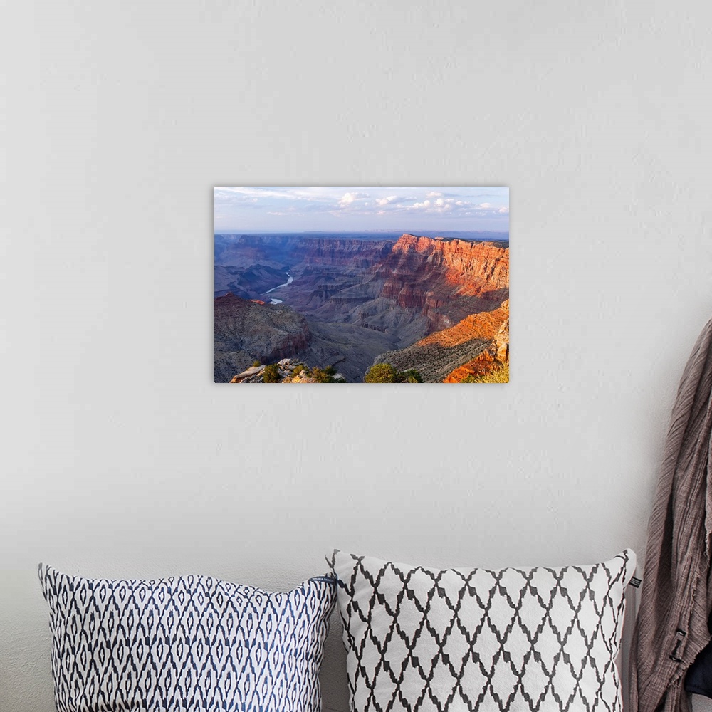 A bohemian room featuring Landscape, high angle photograph on a big canvas, overlooking the Grand Canyon as the sun sets ov...