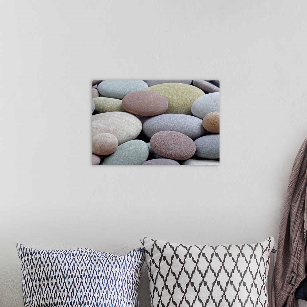 A bohemian room featuring Granite pebbles on beach, full frame