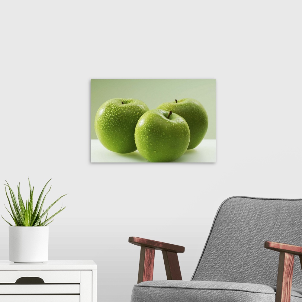 A modern room featuring Granny Smith apples