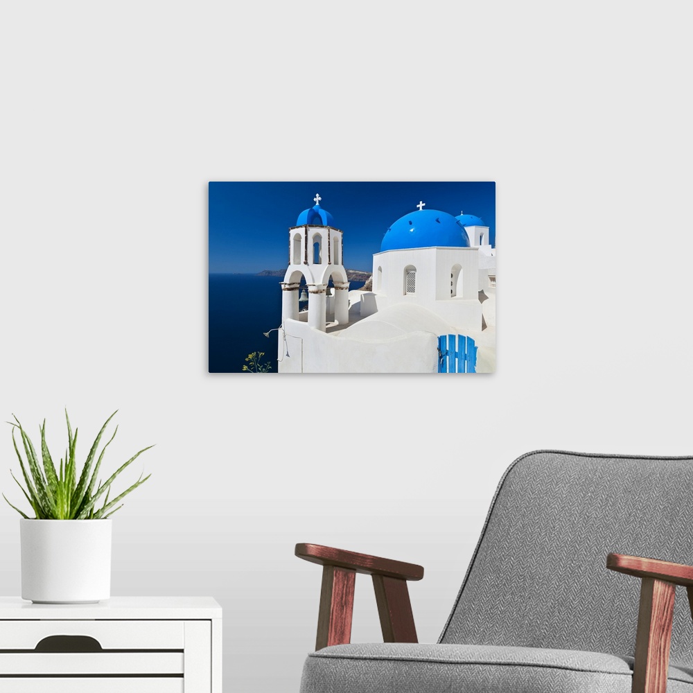 A modern room featuring Greece, Cyclades Islands, Santorini, Oia, Church with bell tower at coast
