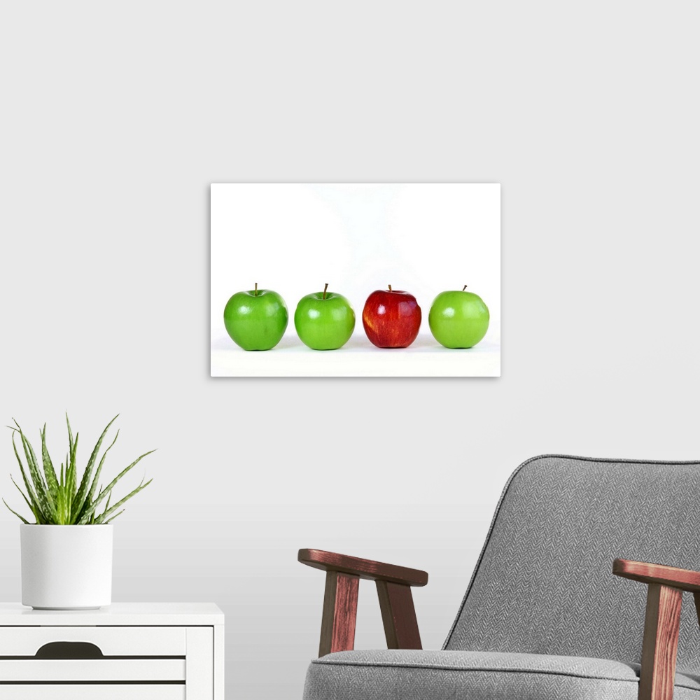 A modern room featuring Green and red apples for healthy eating or difference concepts