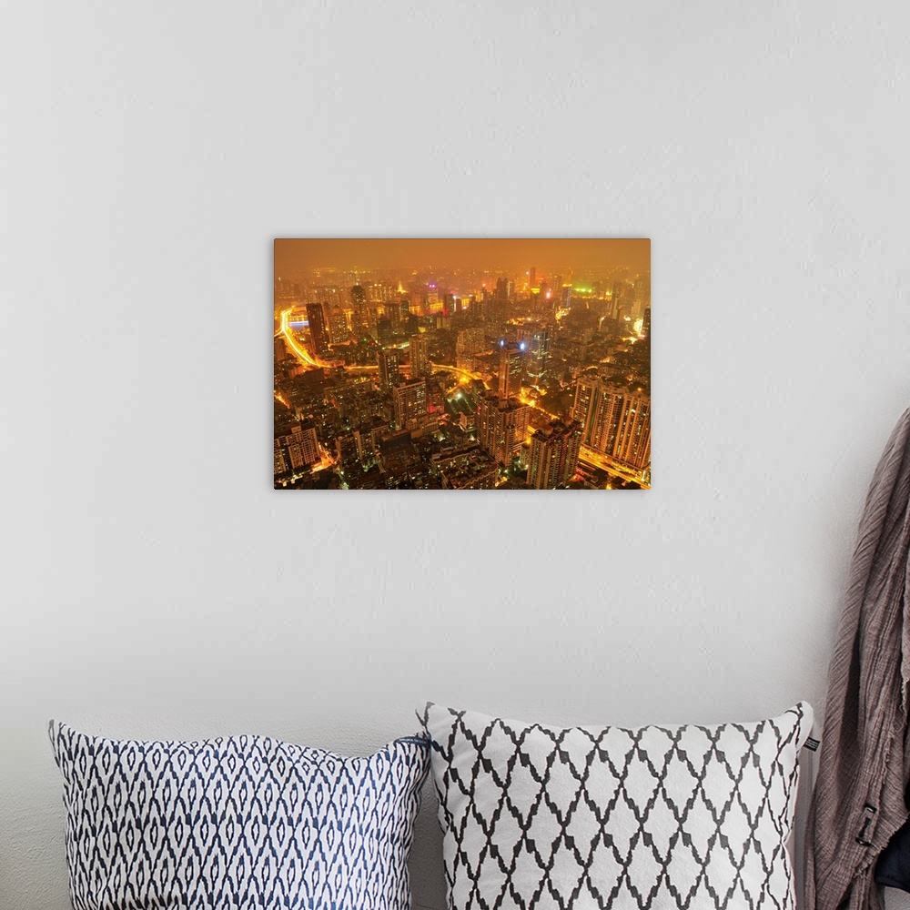 A bohemian room featuring Guangzhou skyline at night.