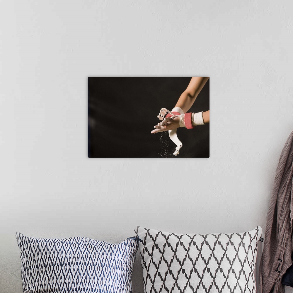 A bohemian room featuring Gymnast chalking up hands