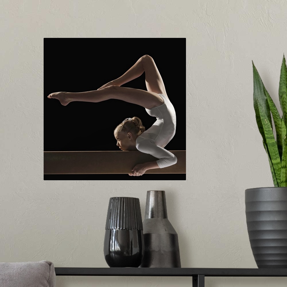 A modern room featuring Gymnast on balance beam