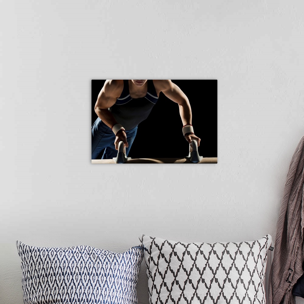 A bohemian room featuring Gymnast on pommel horse