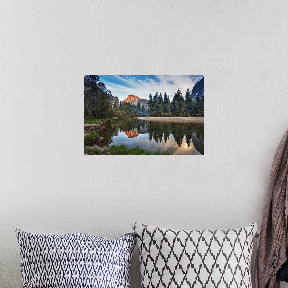 A bohemian room featuring Half Dome reflecting in  Merced river in Yosemite National Park.